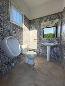 Kúpeľňa v ubytovaní VILLA MACARENA