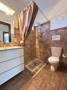 Kúpeľňa v ubytovaní VILLA MACARENA