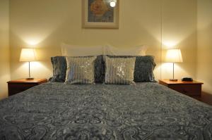 Tempat tidur dalam kamar di GreenGate Cottages