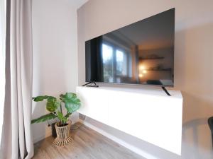 TV a/nebo společenská místnost v ubytování 75 m2, zentral, Küche, Balkon, Parkplatz