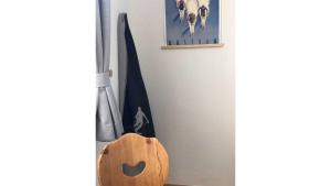 a room with a flag and a wooden cutting board at Gästehaus Haus Barbara in Neustift im Stubaital