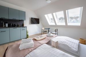Letto o letti in una camera di limehome Stuttgart Elsenhansstr