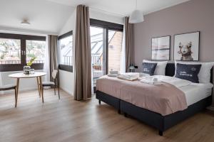 Letto o letti in una camera di limehome Stuttgart Elsenhansstr