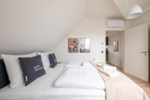 Letto o letti in una camera di limehome Stuttgart Elsenhansstr