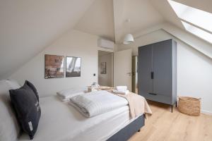 Letto o letti in una camera di limehome Stuttgart Elsenhansstr