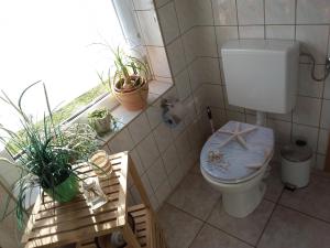 Koupelna v ubytování Ferìenwohnung Mende 1 + 3 fotografie