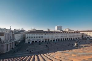 widok na plac w mieście z budynkami w obiekcie San Carlo Suite Torino w Turynie