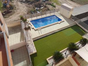 an overhead view of a swimming pool on a house at Deltebre Riu in Deltebre