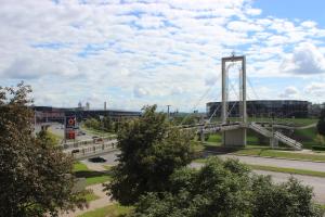 a bridge over a road with a highway at Kaunas Center Apartments - K. Mindaugo g. in Kaunas