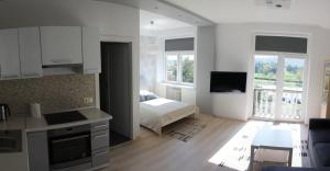 Køkken eller tekøkken på Kaunas Center Apartments - K. Mindaugo g.