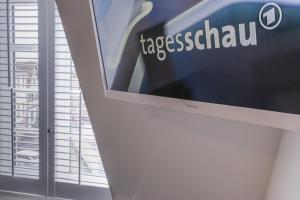 TV a/nebo společenská místnost v ubytování Hotel Schwan - Das Gästehaus Ilse