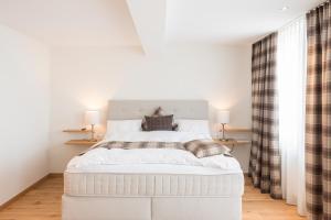 Postel nebo postele na pokoji v ubytování Boutique Hotel Moosegg