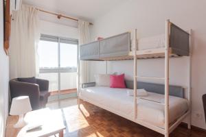 Postel nebo postele na pokoji v ubytování OLIVE - Quarteira
