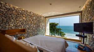 TV a/nebo společenská místnost v ubytování Tolani Resort Kui Buri