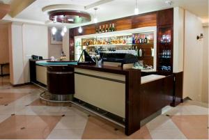 a bar in a hotel room with a counter at Centrum Wypoczynku i Rehabilitacji Umina in Czorsztyn