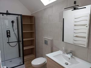 Kúpeľňa v ubytovaní La maison du voisin