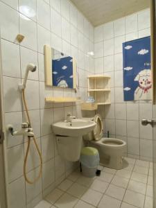 Ett badrum på 海蝸牛民宿