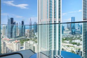 a view of a city skyline from a building at Luxury I Free Weekly Housekeeping I 5 Mins to Dubai Mall in Dubai