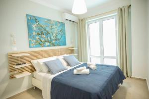 Posteľ alebo postele v izbe v ubytovaní 350m from museum of Acropolis A cozy & quiet house