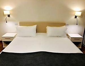 Posteľ alebo postele v izbe v ubytovaní DayBreak B&B