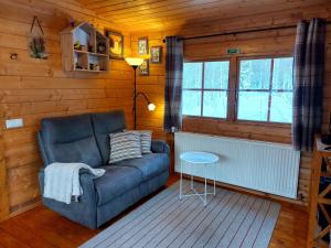 Prostor za sedenje u objektu Bakkakot 1 - Cozy Cabins in the Woods