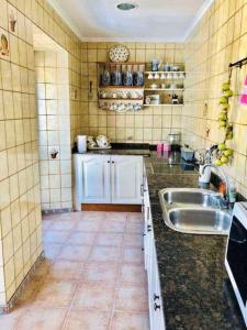 A kitchen or kitchenette at La Casona de Teo Még 23 kép