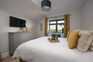 Postel nebo postele na pokoji v ubytování Chy An Eglos + 27 fotografií