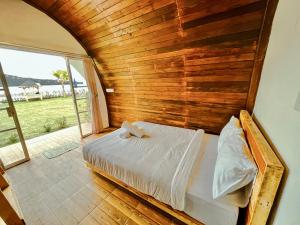 Postel nebo postele na pokoji v ubytování Diamond Glamping by BIO Management