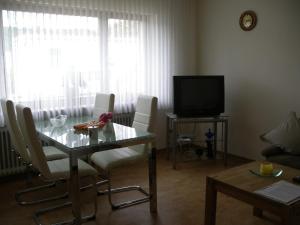 TV a/nebo společenská místnost v ubytování Ferienwohnung Herrig