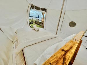 Postel nebo postele na pokoji v ubytování Diamond Glamping by BIO Management