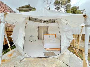Postel nebo postele na pokoji v ubytování Diamond Glamping by BIO Management
