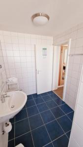 Koupelna v ubytování Hotel Garni Superior
