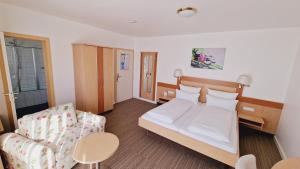 Postel nebo postele na pokoji v ubytování Hotel Garni Superior