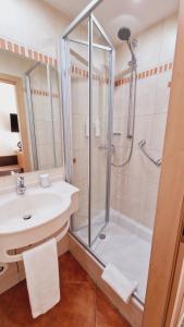 Koupelna v ubytování Hotel Garni Superior