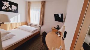 TV a/nebo společenská místnost v ubytování Hotel Garni Superior