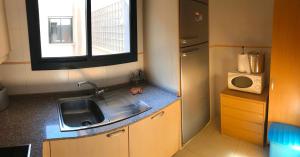 Kuchyňa alebo kuchynka v ubytovaní Sun Hill Los Pacos 2 Bed Apt