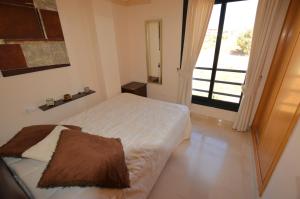 Posteľ alebo postele v izbe v ubytovaní Sun Hill Los Pacos 2 Bed Apt