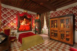 Säng eller sängar i ett rum på Antica Dimora De Michaelis