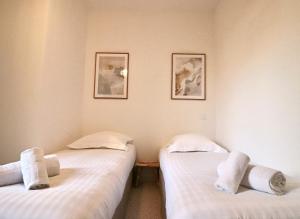 Posteľ alebo postele v izbe v ubytovaní FERSEN Bright apartment renovated for 5 people in center of Old Antibes