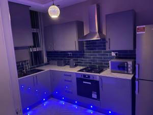Kuchyň nebo kuchyňský kout v ubytování Imperial Suites Bradford