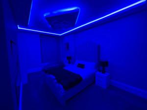 Voodi või voodid majutusasutuse Imperial Suites Bradford toas