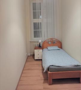 Postel nebo postele na pokoji v ubytování Rynek 7