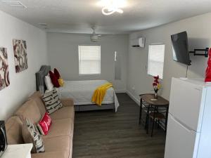 Ein Bett oder Betten in einem Zimmer der Unterkunft Incredible comfortable apartments near the airport and beaches