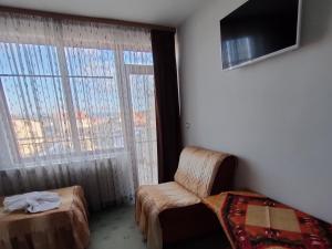 TV a/nebo společenská místnost v ubytování Guest Rooms Grachenovi + 14 fotografií