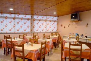 Reštaurácia alebo iné gastronomické zariadenie v ubytovaní Le Giare B&B