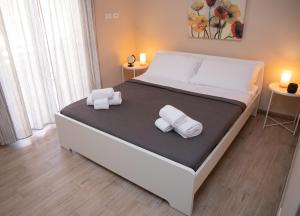 Posteľ alebo postele v izbe v ubytovaní Sofia Apartment