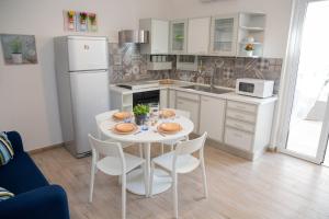 Kuchyňa alebo kuchynka v ubytovaní Sofia Apartment