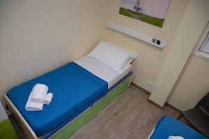 Posteľ alebo postele v izbe v ubytovaní Sofia Apartment