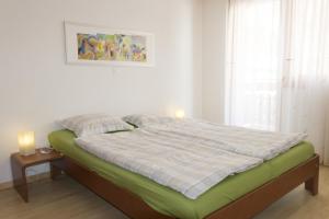 Postel nebo postele na pokoji v ubytování Dominic A2