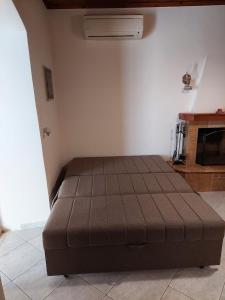 A bed or beds in a room at Casa de la Vita